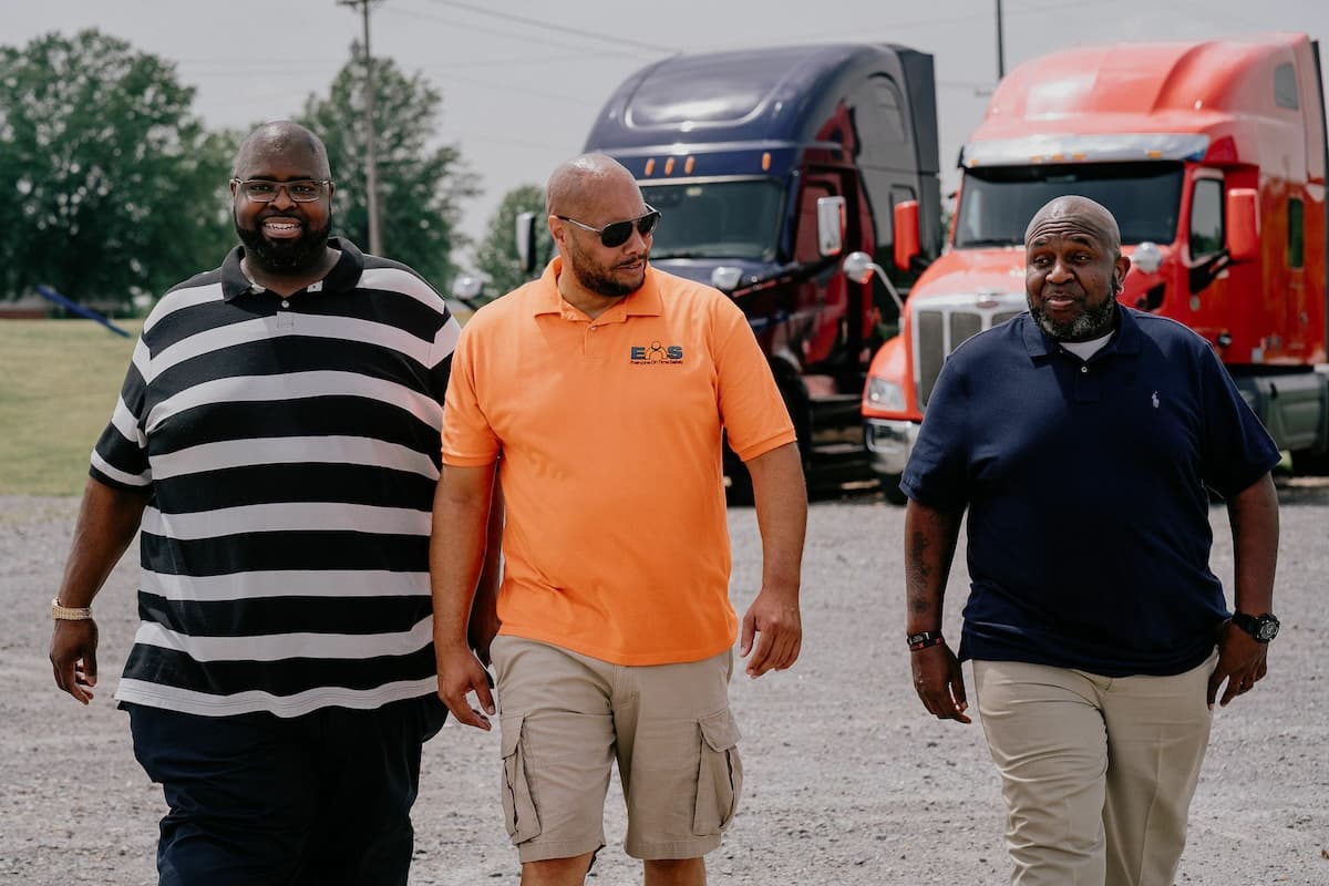 EOS team members walking through the truck yard together